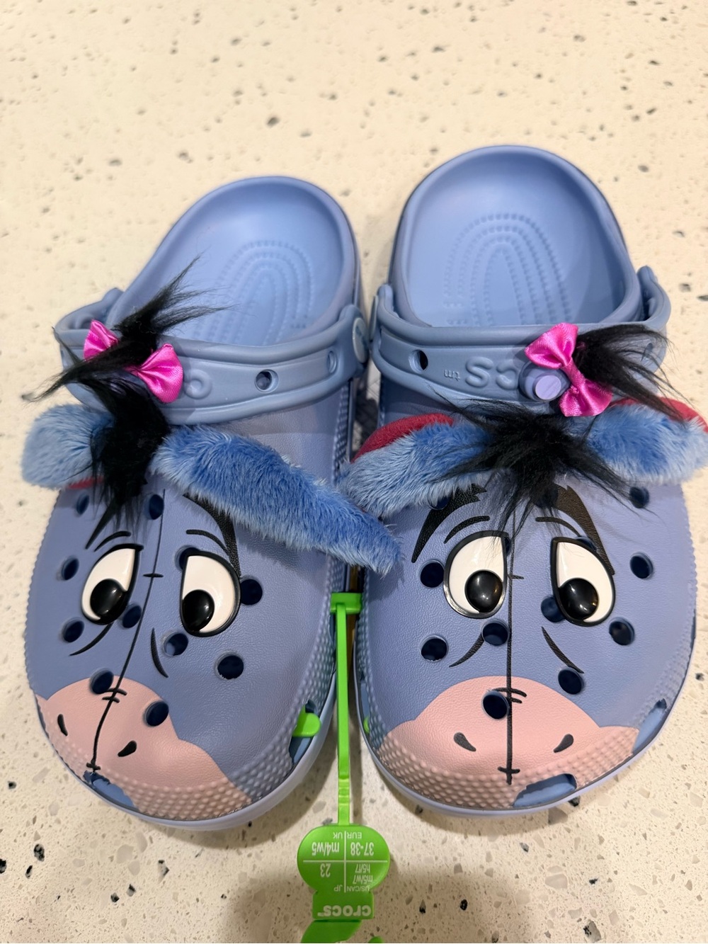 New Disney womens Sz 7, 11, 12 CROCS Eeyore Light Blue Clogs with Pink Bow Accen